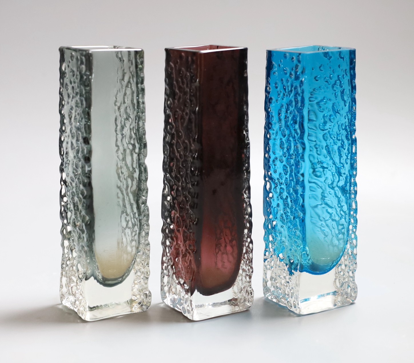 A trio of Whitefriars 'Nailhead' vases, model 9683, designed by Geoffrey Baxter, each 17cm high